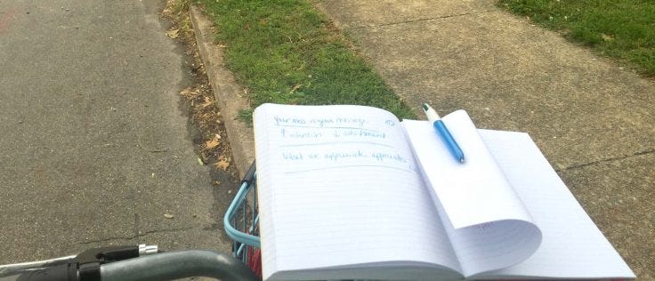 open notebook on bike handles